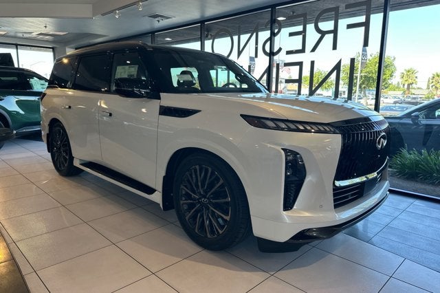 2027 INFINITI QX80 AUTOGRAPH in Radiant White/Black Obsidian — front three-quarter view