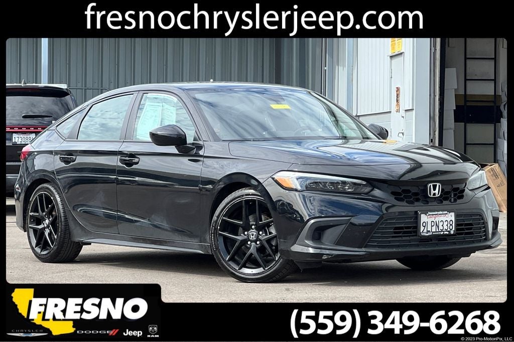 2024 Honda Civic Sport in Crystal Black Pearl — front three-quarter view