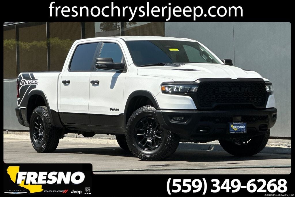2025 RAM 1500 Rebel in Bright White Clearcoat — front three-quarter view
