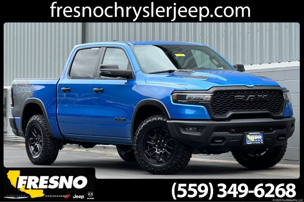 2025 RAM 1500 Rebel in Hydro Blue Pearlcoat — front three-quarter view