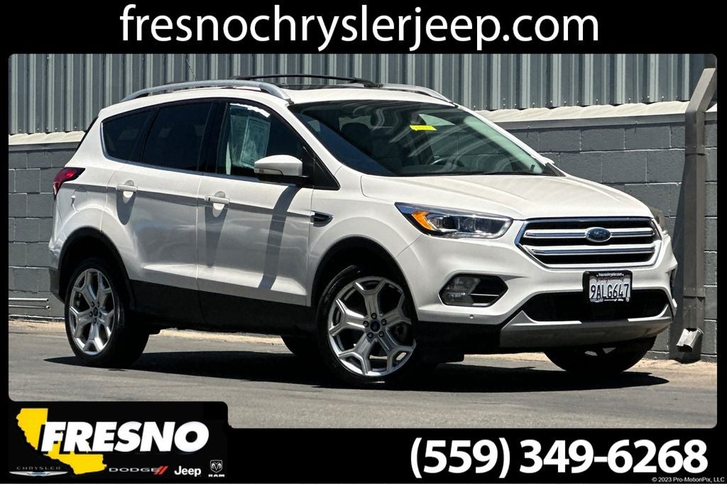 2019 Ford Escape Titanium in White Platinum — front three-quarter view