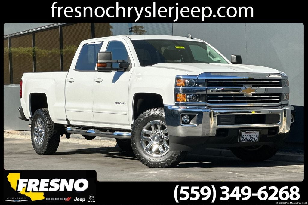 2017 Chevrolet Silverado 2500HD LT in Summit White — front three-quarter view