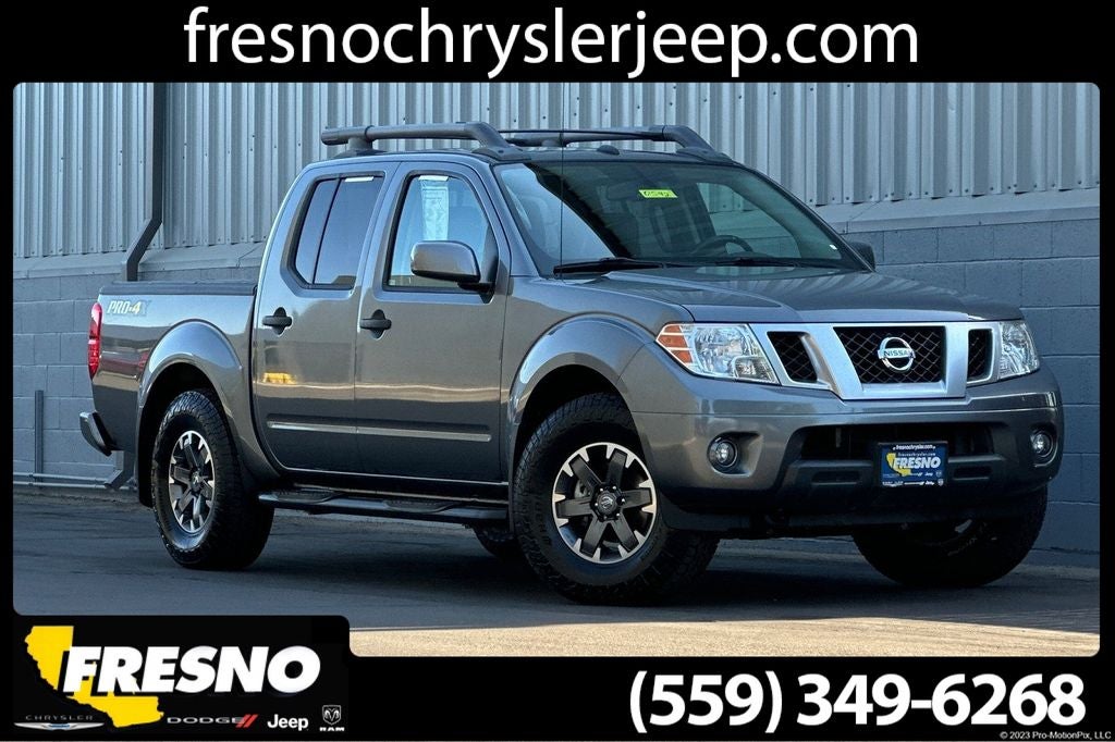 2020 Nissan Frontier PRO-4X in Gun Metallic — front three-quarter view
