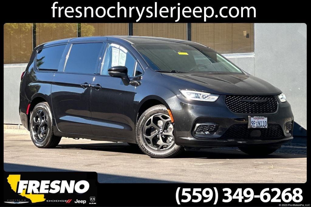 2023 Chrysler Pacifica Hybrid Touring L in Brilliant Black Crystal Pearlcoat — front three-quarter view